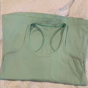 Mint green lululemon cool racerback. Some wear.